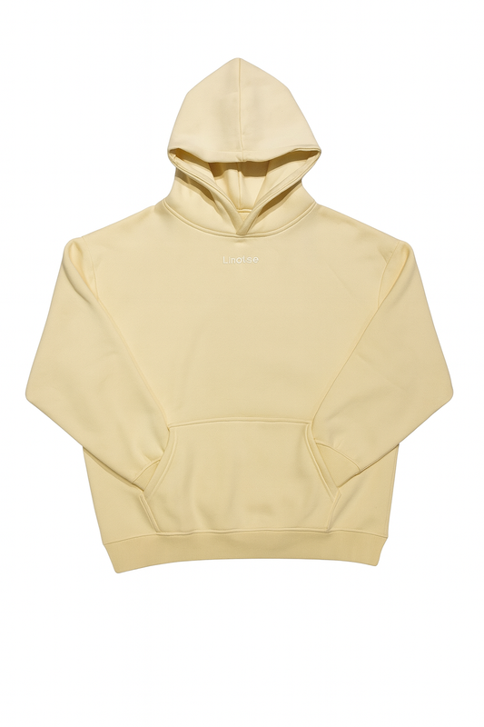 Beige Lhotse hoodie and sweatpants set laid flat on a white background, featuring minimalist design with embroidered "Lhotse" logos, large kangaroo pocket on the hoodie, elastic waistband and drawstring on the pants, and ribbed cuffs for a clean streetwear look.