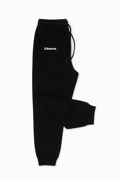 Black sweatpants with a brand logo on a white background